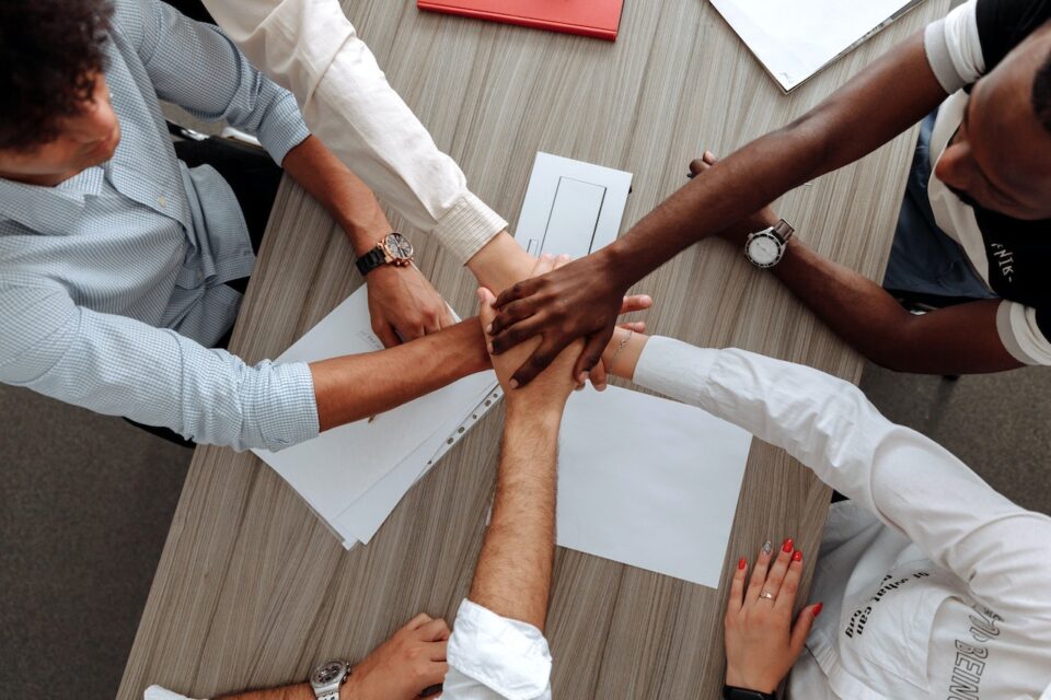 Picture of caring hands of colleagues